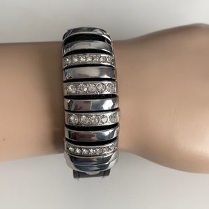 Leather, silver, and bling bracelet.